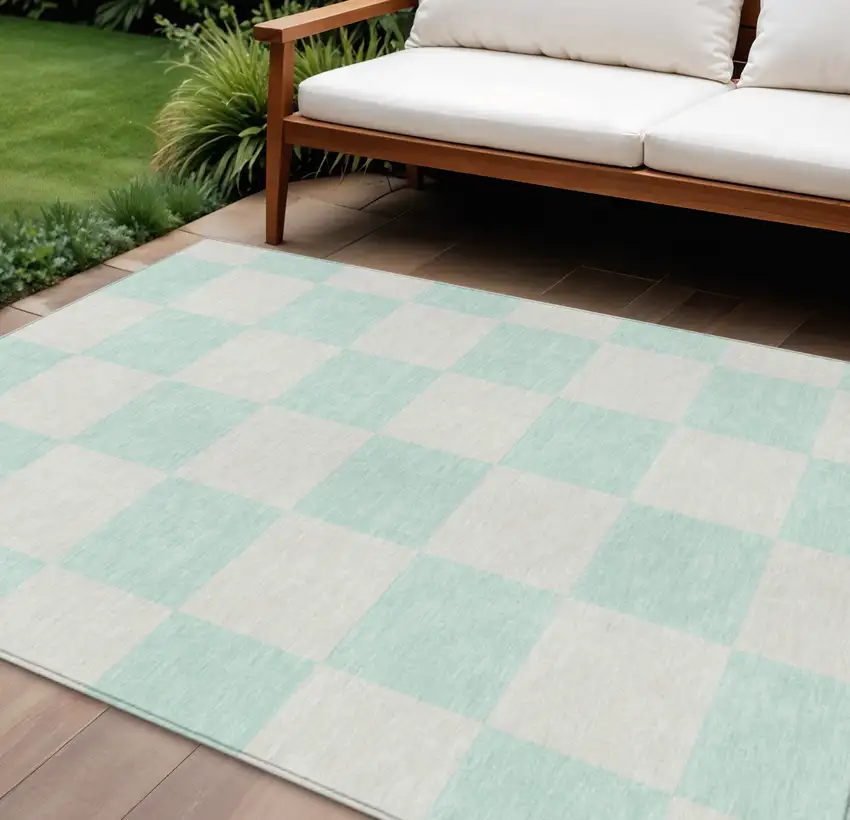 Mint Green And Ivory Geometric Washable Indoor Outdoor Area Rug Photo 1