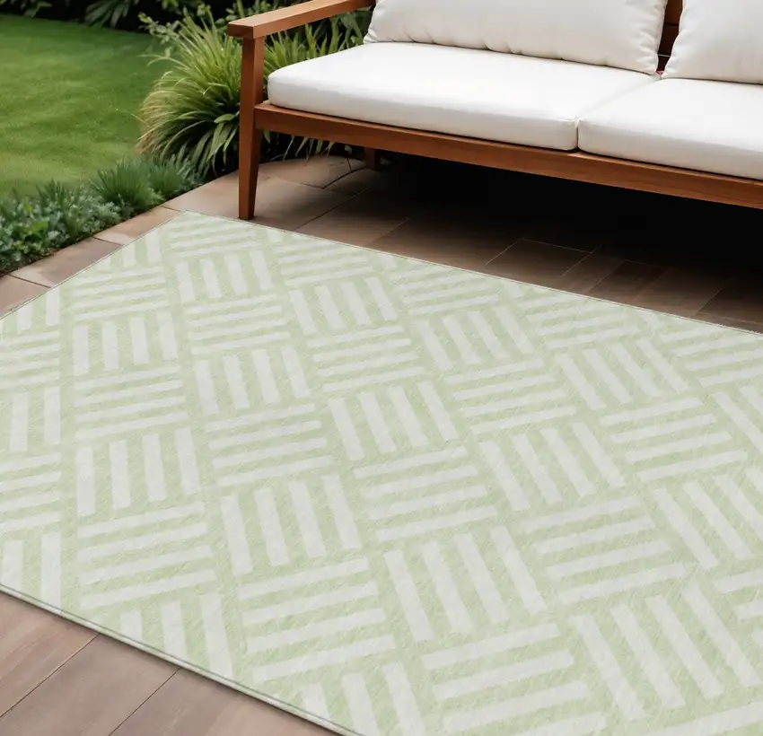 Mint Green And Ivory Geometric Washable Indoor Outdoor Area Rug Photo 1