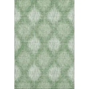 Photo of Mint Green And Ivory Ikat Washable Area Rug With UV Protection
