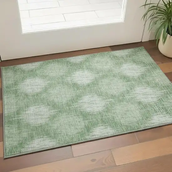 Mint Green And Ivory Ikat Washable Area Rug With UV Protection Photo 2