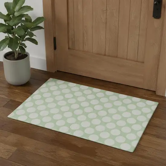 Mint Green And Ivory Polka Dot Washable Area Rug With UV Protection Photo 1