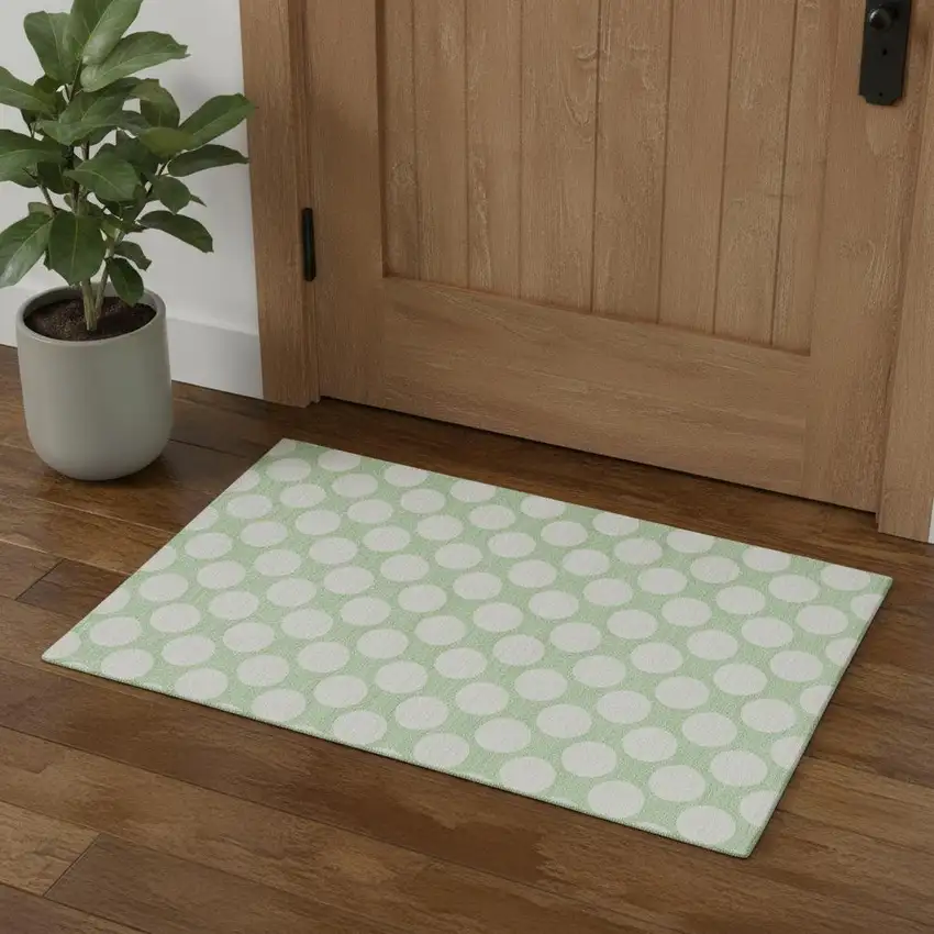 Mint Green And Ivory Polka Dot Washable Area Rug With UV Protection Photo 1