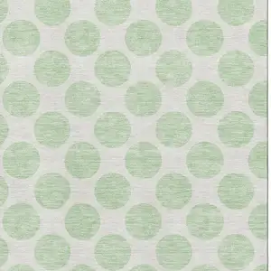 Photo of Mint Green And Ivory Polka Dot Washable Area Rug With UV Protection