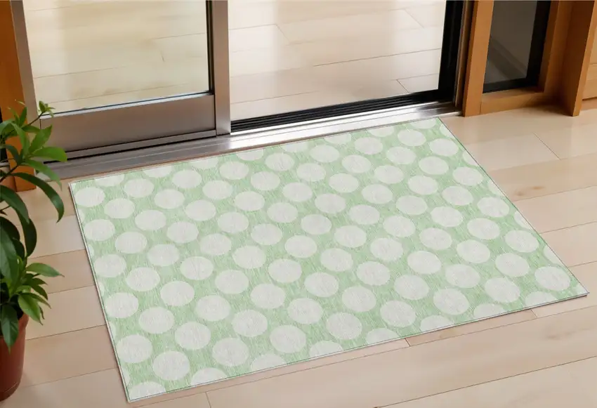 Mint Green And Ivory Polka Dot Washable Indoor Outdoor Area Rug Photo 1
