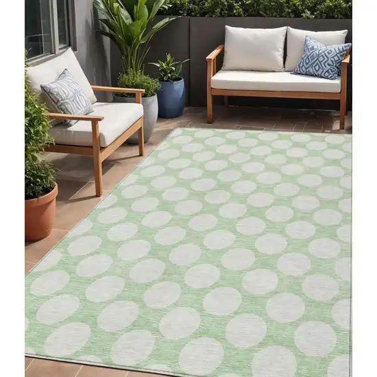 Mint Green And Ivory Polka Dot Washable Indoor Outdoor Area Rug Photo 1