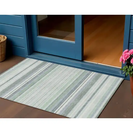 Mint Green And Ivory Striped Washable Indoor Outdoor Area Rug Photo 1