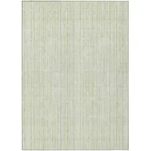 Photo of Mint Green And Ivory Striped Washable Indoor Outdoor Area Rug
