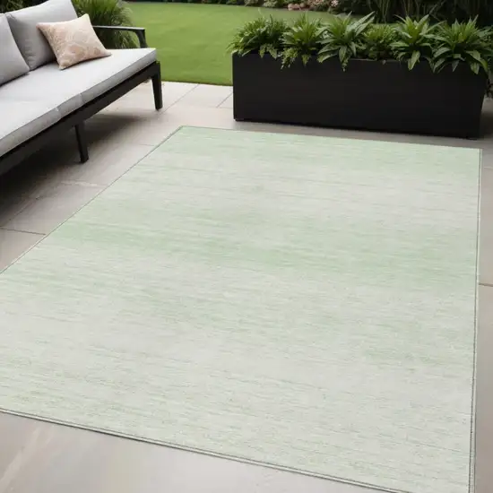 Mint Green And Ivory Striped Washable Indoor Outdoor Area Rug Photo 1