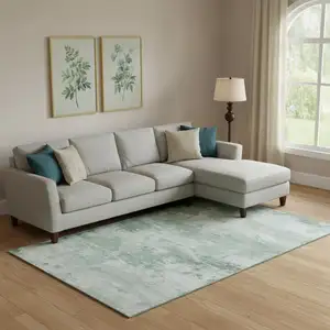 Photo of Mint Green And Pale Aqua Abstract Washable Area Rug With UV Protection