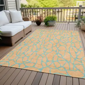 Photo of Mint Green And Peach Geometric Washable Indoor Outdoor Area Rug