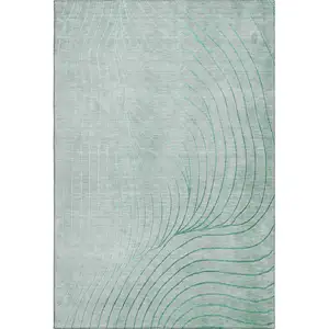 Photo of Mint Green And Silver Abstract Washable Area Rug With UV Protection