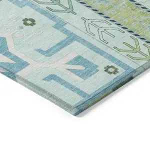 Photo of Mint Green Blue And Ivory Aztec Washable Indoor Outdoor Area Rug