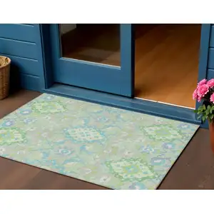 Photo of Mint Green Blue And Ivory Oriental Washable Indoor Outdoor Area Rug