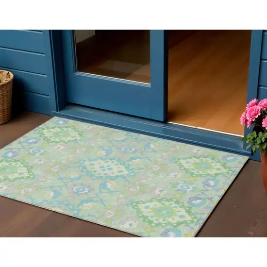 Mint Green Blue And Ivory Oriental Washable Indoor Outdoor Area Rug Photo 1