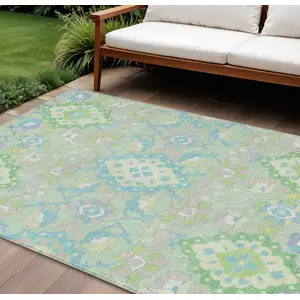 Photo of Mint Green Blue And Ivory Oriental Washable Indoor Outdoor Area Rug