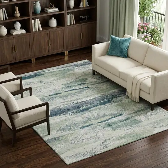 Mint Green Ivory And Blue Abstract Washable Area Rug With UV Protection Photo 1