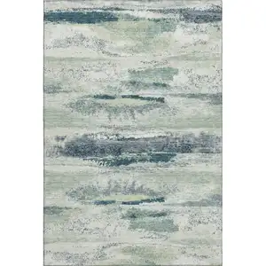 Photo of Mint Green Ivory And Blue Abstract Washable Area Rug With UV Protection