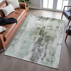 Photo of Mint Green Ivory And Gray Abstract Washable Area Rug With UV Protection
