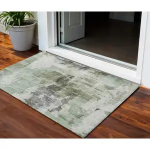Photo of Mint Green Ivory And Gray Abstract Washable Indoor Outdoor Area Rug