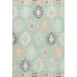 Photo of Mint Green Ivory And Peach Southwestern Washable Area Rug With UV Protection