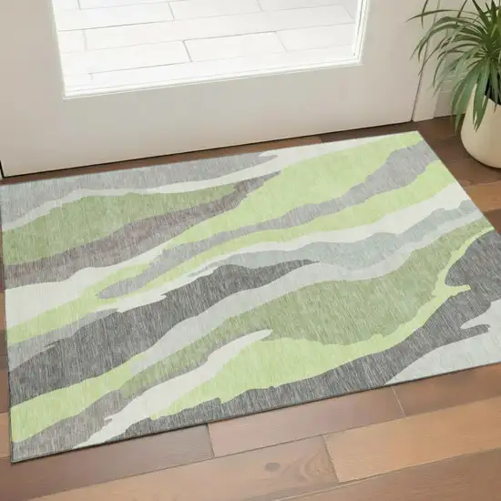 Mint Green Ivory And Silver Abstract Washable Area Rug With UV Protection Photo 1