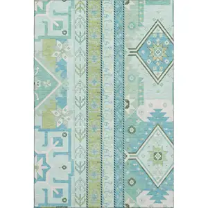 Photo of Mint Green Ivory And Teal Southwestern Washable Area Rug With UV Protection