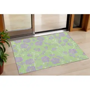 Photo of Mint Green Purple And Ivory Floral Washable Indoor Outdoor Area Rug