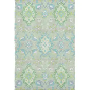 Photo of Mint Green Teal And Lavender Oriental Washable Area Rug With UV Protection