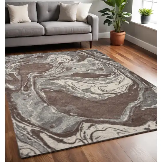 Brown And Ivory Abstract Area Rug Photo 1