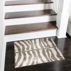 Photo of Mocha and Cream Zebra Print Shag Handmade Non Skid Area Rug