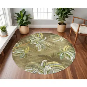 Photo of Moss Green Hand Tufted Tropical Trees Round Indoor Area Rug