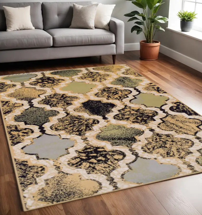 Black And Ivory Quatrefoil Distressed Area Rug Photo 1