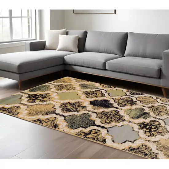 Black And Ivory Quatrefoil Distressed Area Rug Photo 1