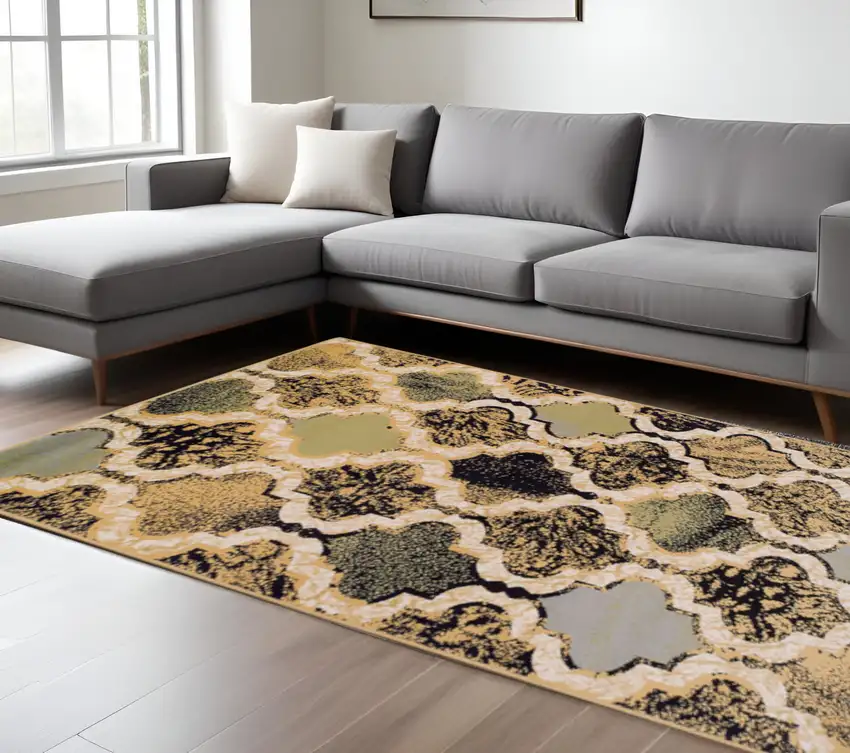 Black And Ivory Quatrefoil Distressed Area Rug Photo 1