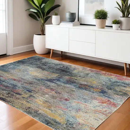 Blue And Ivory Abstract Distressed Area Rug Photo 1