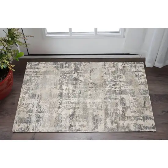 Gray And Tan Abstract Area Rug Photo 1