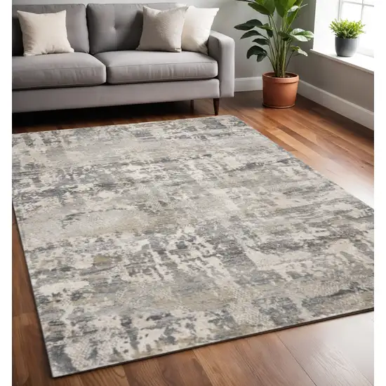 Gray And Tan Abstract Area Rug Photo 1