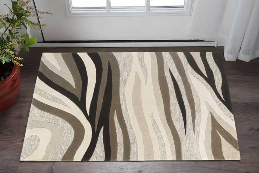 Beige Ivory And Black Wool Abstract Hand Tufted Area Rug Photo 1