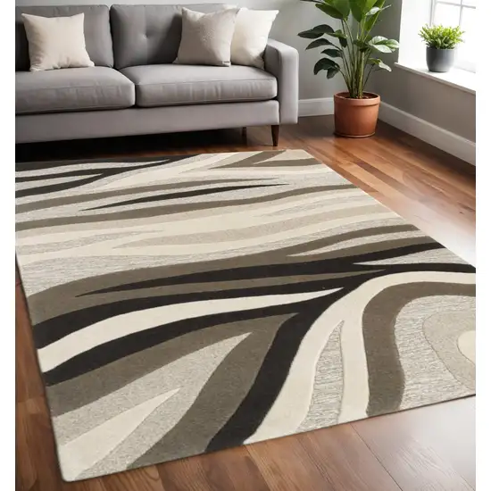 Beige Ivory And Black Wool Abstract Hand Tufted Area Rug Photo 1