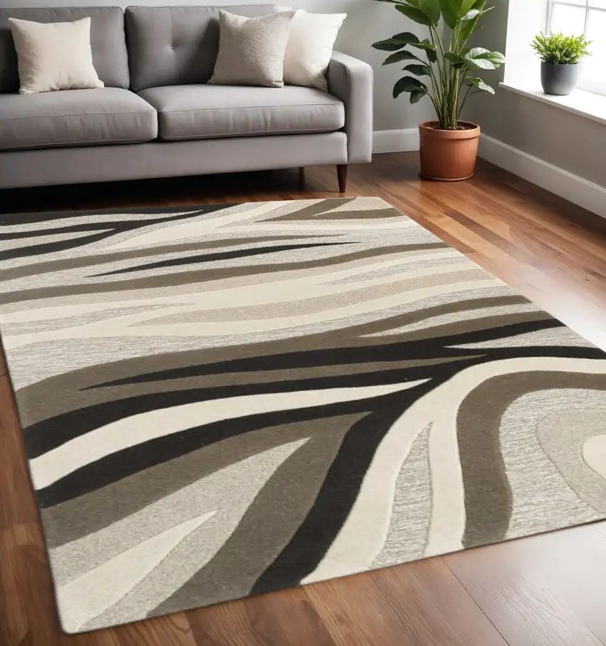Beige Ivory And Black Wool Abstract Hand Tufted Area Rug Photo 1