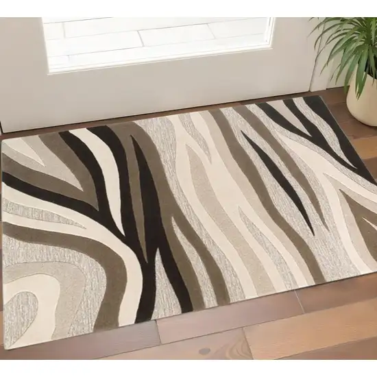 Beige Ivory And Black Wool Abstract Hand Tufted Area Rug Photo 1
