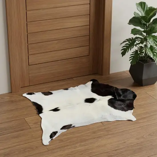 Natural Black And White Calfskin Area Rug Photo 1