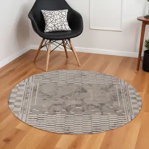 Photo of Natural Grey Machine Woven Bordered Abstract Lines Round Indoor Area Rug