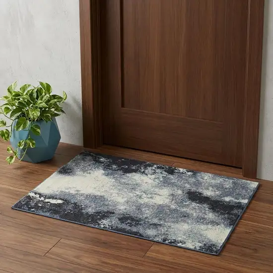Blue and Ivory Abstract Power Loom Area Rug Photo 1