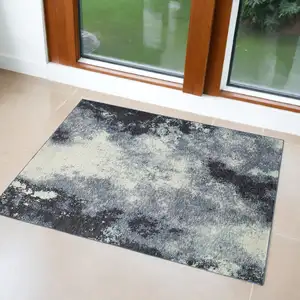 Photo of Navy And Ivory Abstract Power Loom Stain Resistant Area Rug