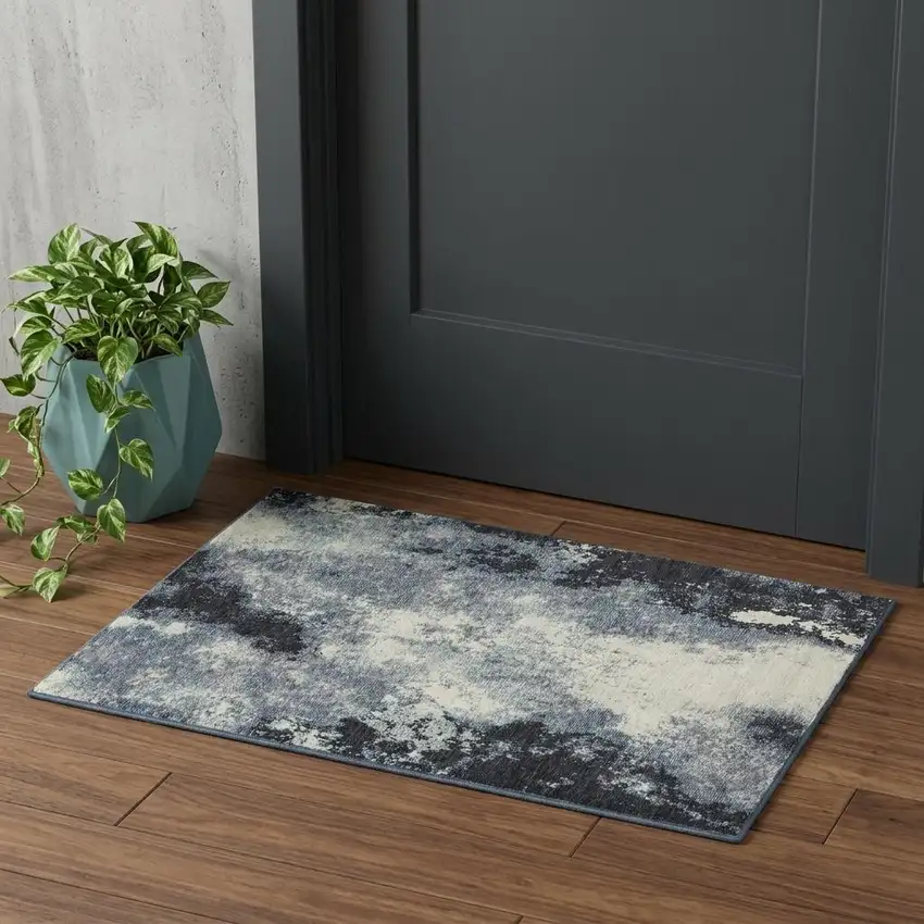 Blue and Ivory Abstract Power Loom Area Rug Photo 1