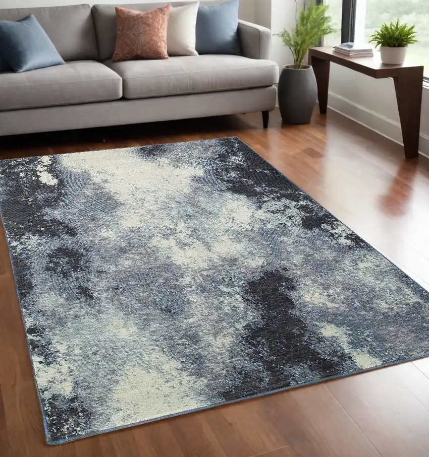 Blue and Ivory Abstract Power Loom Area Rug Photo 1
