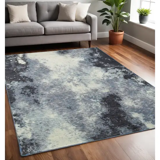 Blue and Ivory Abstract Power Loom Area Rug Photo 1