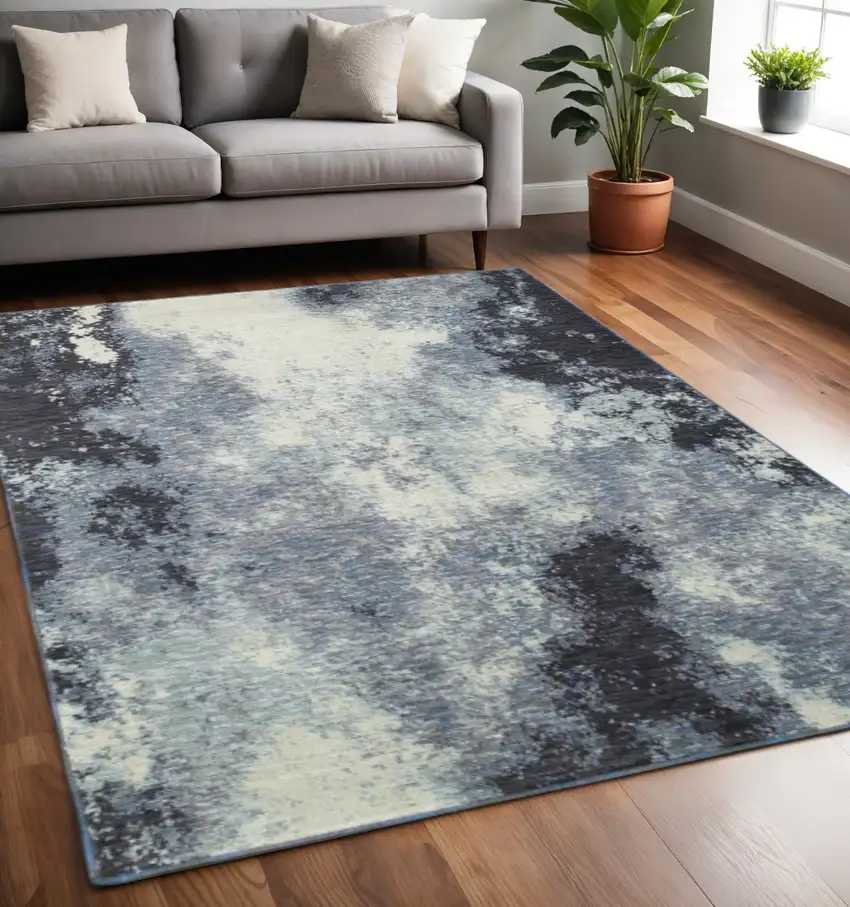 Blue and Ivory Abstract Power Loom Area Rug Photo 1