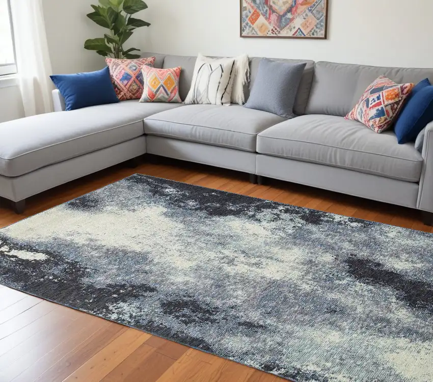 Blue and Ivory Abstract Power Loom Area Rug Photo 1